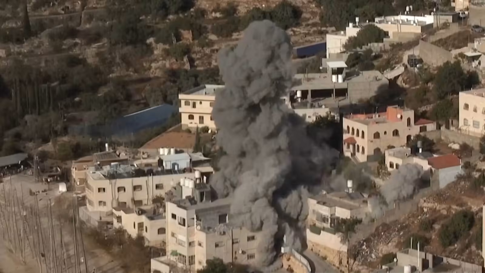 Israeli forces blow up homes of Palestinians accused of killing soldiers | Israel-Palestine conflict
